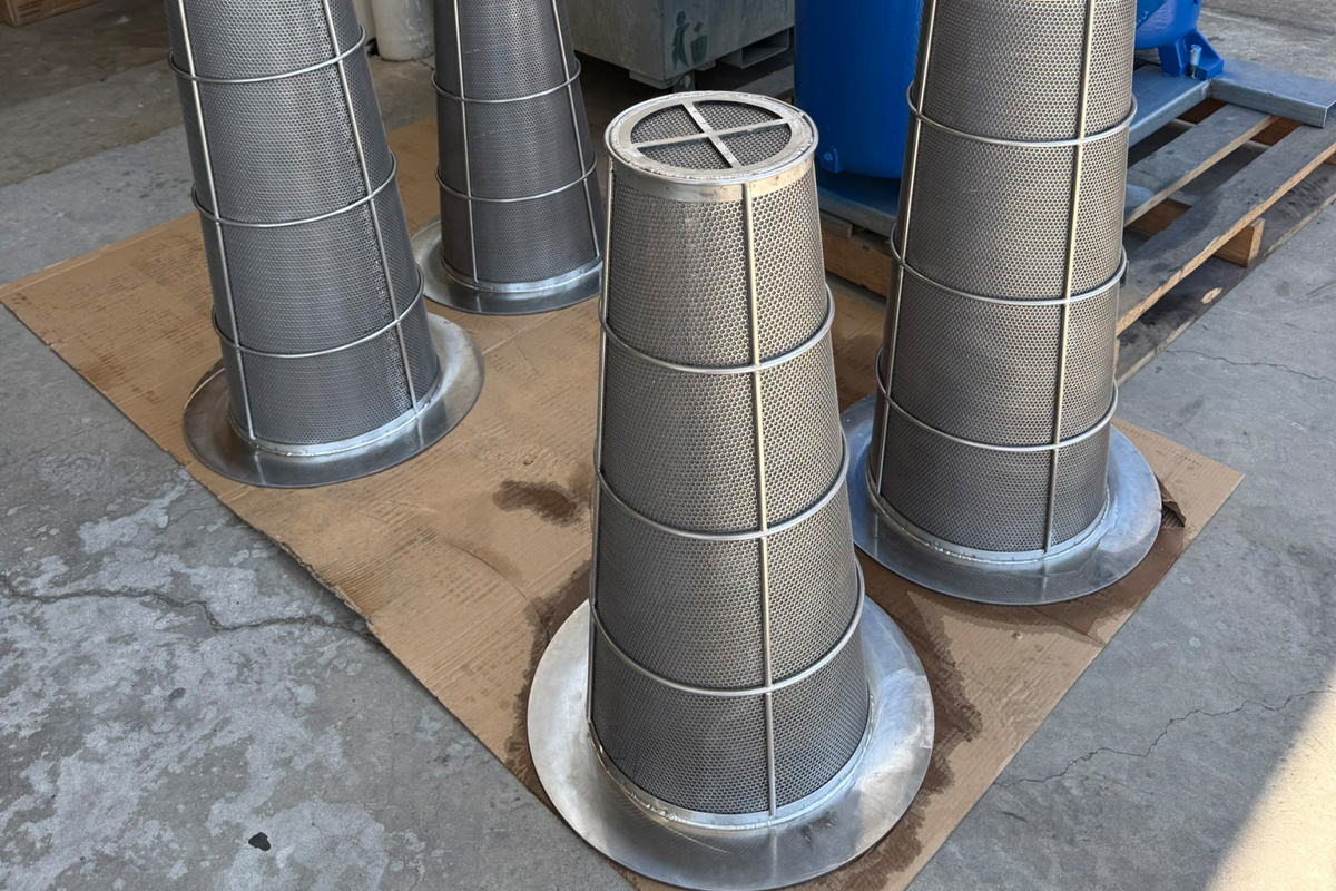 Industrial filtration products including strainers, housings, and skids