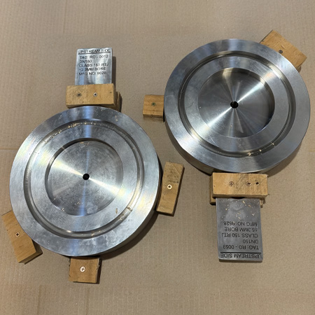 Restricted orifice plate manufactured for industrial piping